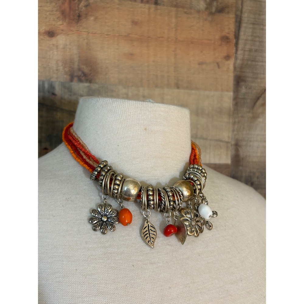 Orange Multi Strand Seed Bead Bib Necklace Silver Tone Flower Leaf Charms